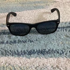 Rayban sunglasses in black, with tinted lenses, with small crack